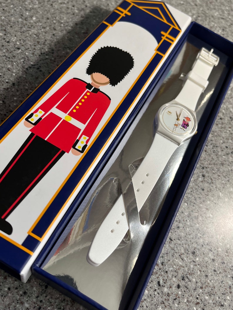 Swatch Watch How Majestic Queen Elizabeths 70 year Jubilee celebration 34mm, brand new, battery, box, paperwork and crown with Corgi dog