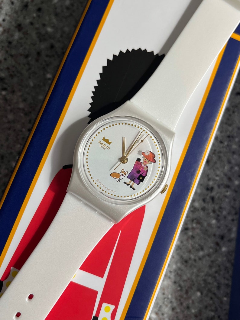 Swatch Watch How Majestic Queen Elizabeths 70 year Jubilee celebration 34mm, brand new, battery, box, paperwork and crown with Corgi dog