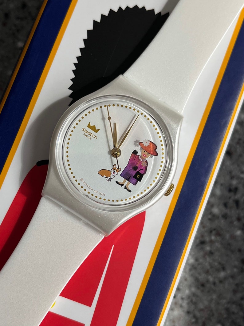 Swatch Watch How Majestic Queen Elizabeths 70 year Jubilee celebration 34mm, brand new, battery, box, paperwork and crown with Corgi dog