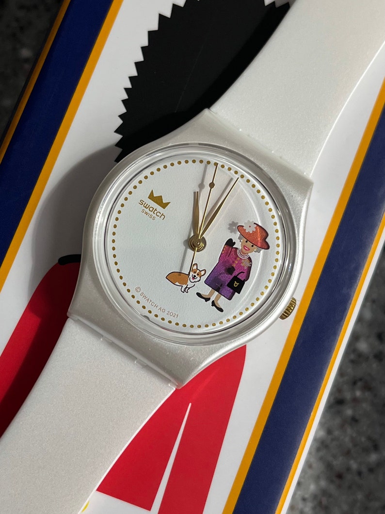 Swatch Watch How Majestic Queen Elizabeths 70 year Jubilee celebration 34mm, brand new, battery, box, paperwork and crown with Corgi dog
