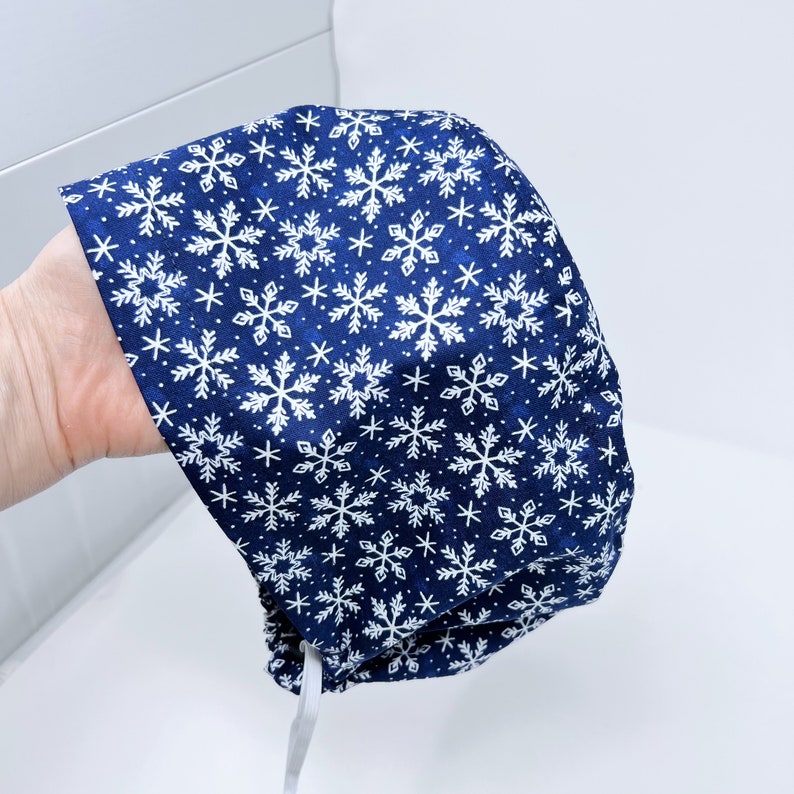 Christmas Euro Scrub Cap for Women, Snowflakes Surgical cap with Satin Lined Option by Paradise Caps.
Analyze listing