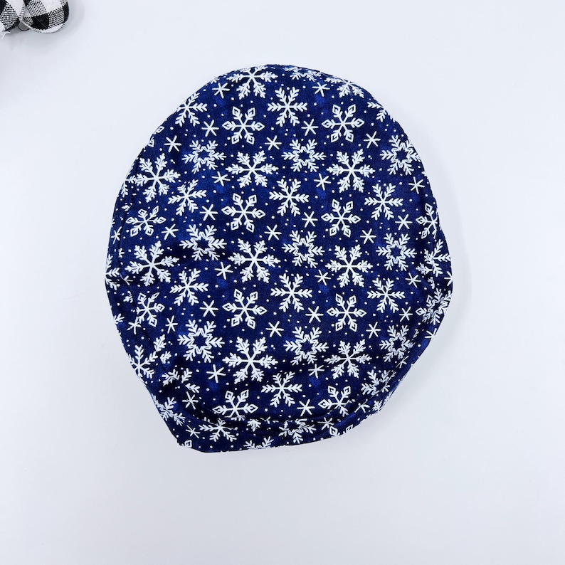 Christmas Euro Scrub Cap for Women, Snowflakes Surgical cap with Satin Lined Option by Paradise Caps.
Analyze listing
