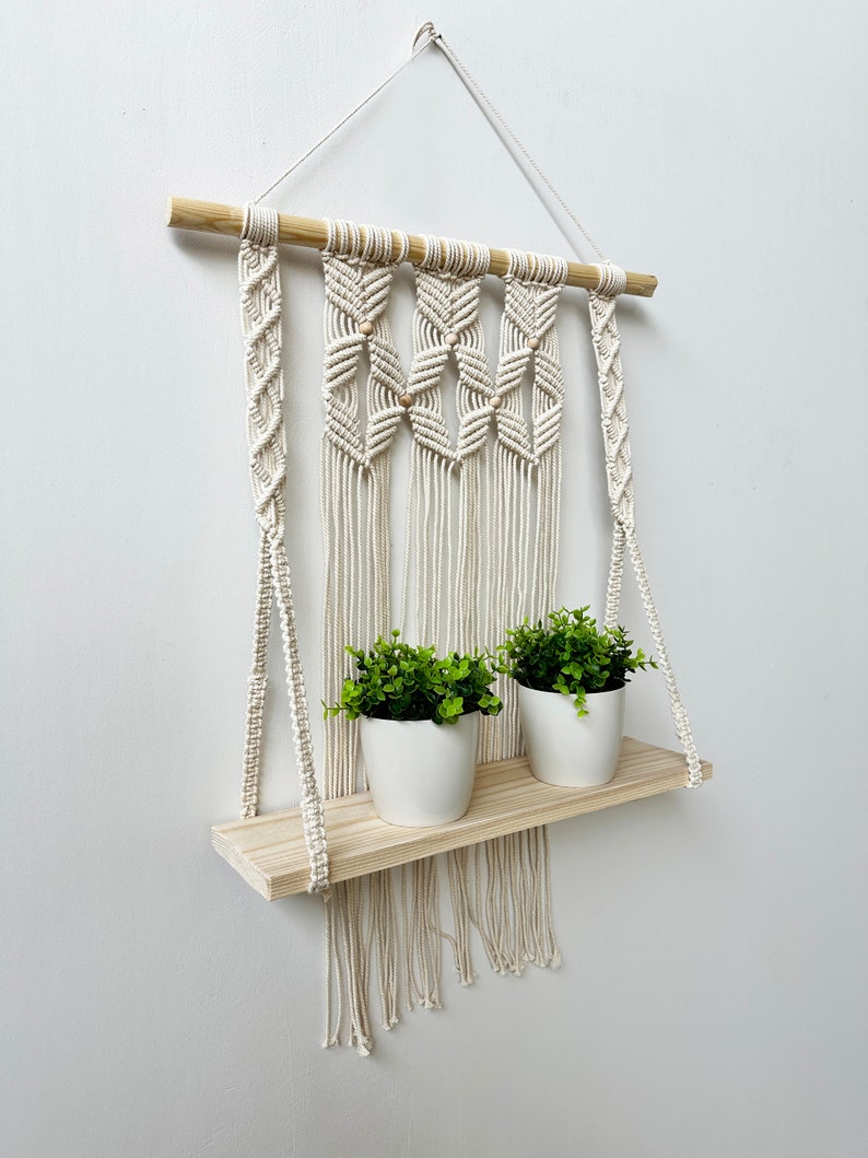 Handmade Macrame Plant Shelf: Boho Wall Hanging with Wooden Dowel