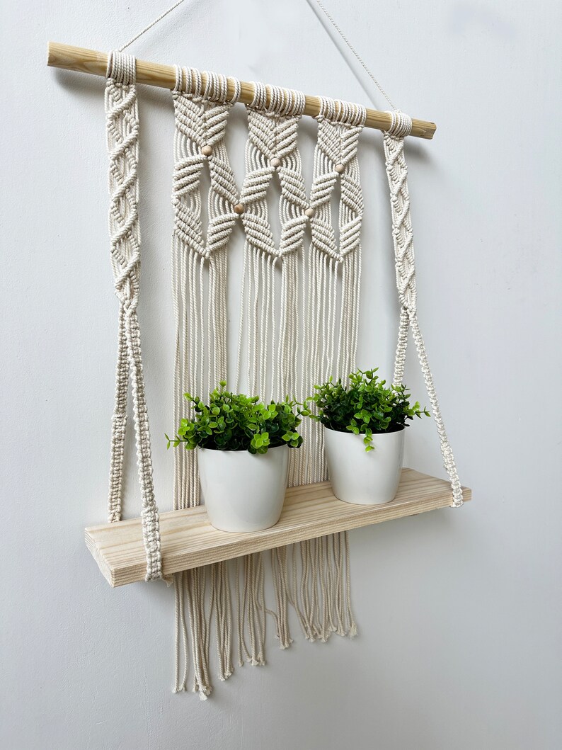 Handmade Macrame Plant Shelf: Boho Wall Hanging with Wooden Dowel