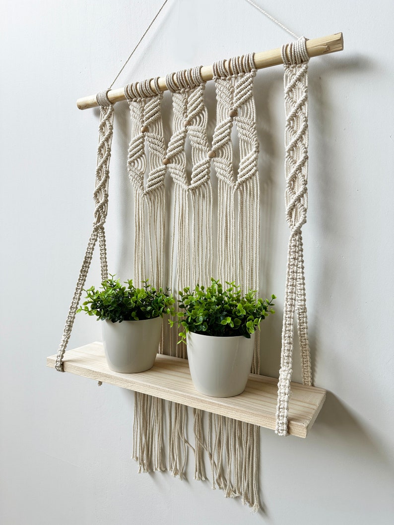 Handmade Macrame Plant Shelf: Boho Wall Hanging with Wooden Dowel