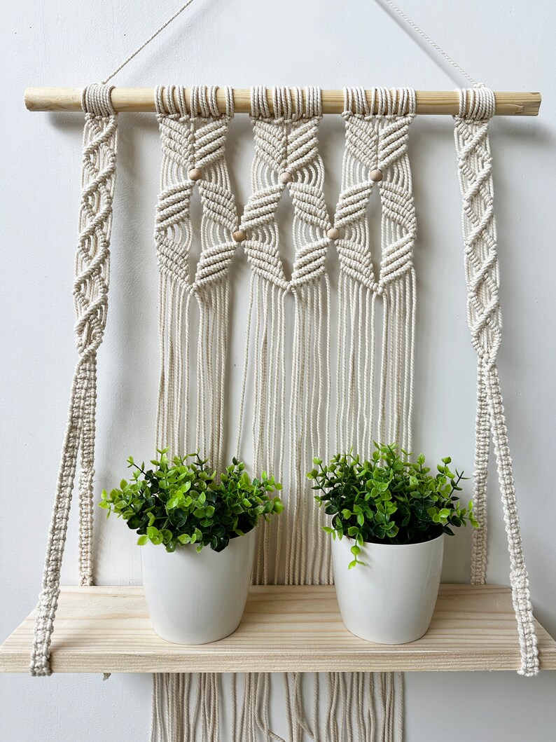 Handmade Macrame Plant Shelf: Boho Wall Hanging with Wooden Dowel