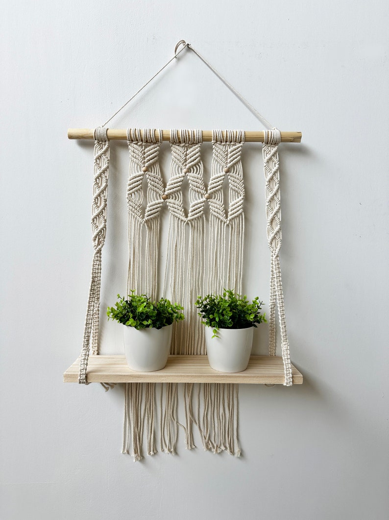 Handmade Macrame Plant Shelf: Boho Wall Hanging with Wooden Dowel
