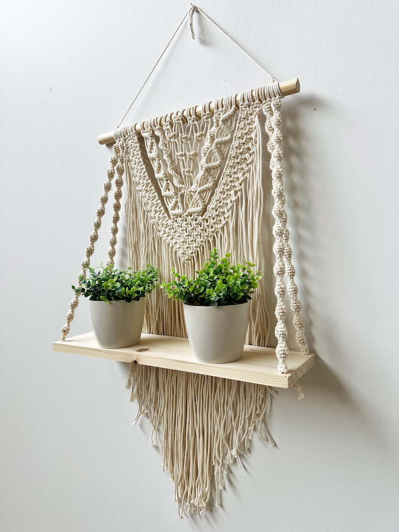 Handmade Macrame Plant Shelf: Boho Wall Hanging with Wooden Dowel