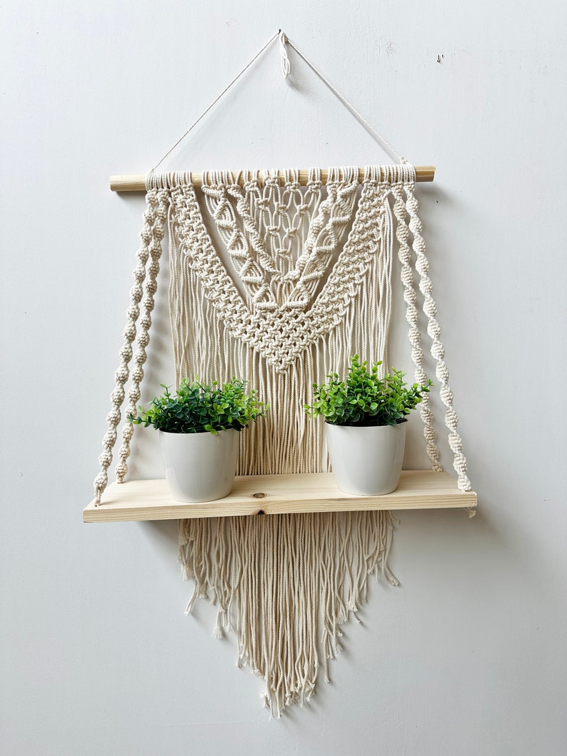 Handmade Macrame Plant Shelf: Boho Wall Hanging with Wooden Dowel