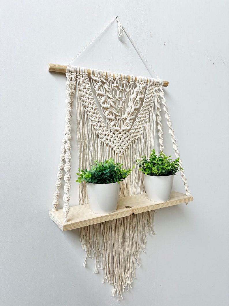 Handmade Macrame Plant Shelf: Boho Wall Hanging with Wooden Dowel
