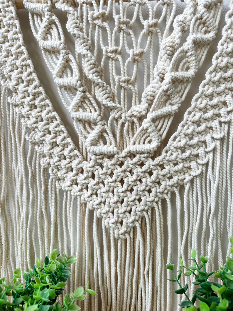 Handmade Macrame Plant Shelf: Boho Wall Hanging with Wooden Dowel