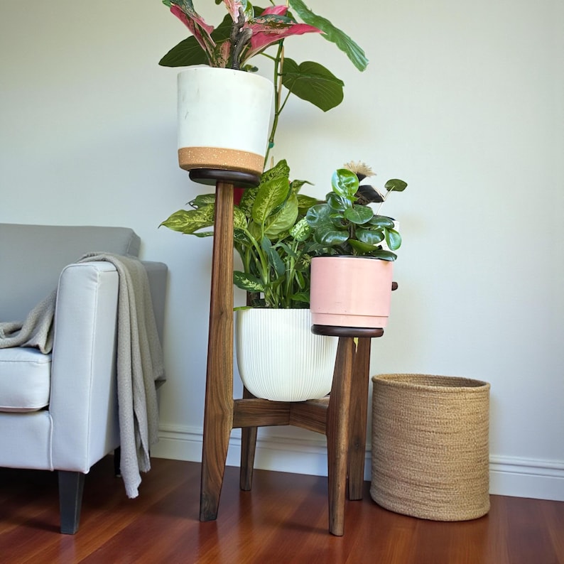 5 tier tassel free plant holder, mid century modern wooden plant stand with adjustable leveling feet.